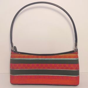 Unbranded small multi colored handbag, purse.